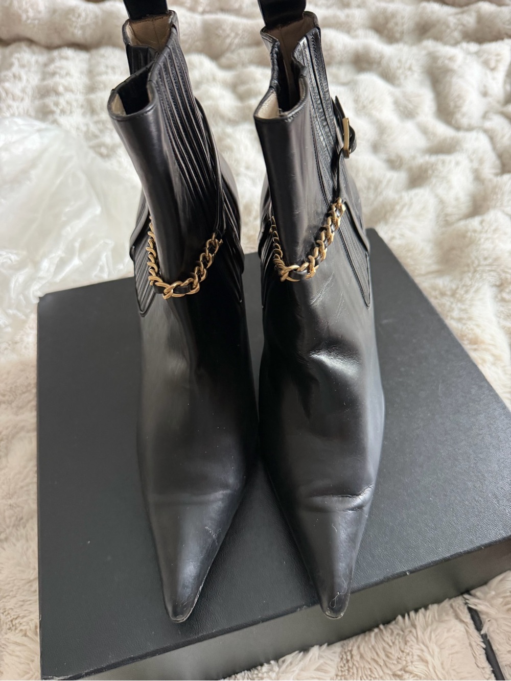 CHANEL Black Leather Pointed Ankle Boots with Gold Chain